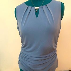 Grey sleeveless blouse with gold hardware